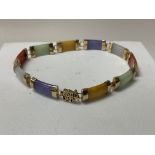 A 9ct gold Chinese multicoloured stone bracelet.