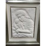 A framed Bill Mack raised relief plaque depicting mother and child. 62 cm approx in height, not