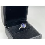 An 18ct white gold ring set with an oval tanzanite