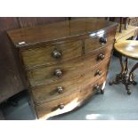 An Early Victorian Mahogany bow fronted chest of drawers fitted with two short and three long