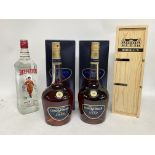 2 x bottles of Courvoisier VSOP, a bottle of Bordeaux and a bottle of Beefeater gin