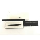 A Boxed Mount Blanc Pen with service Guide.