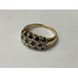 A 14ct sapphire and diamond set ring