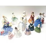 A Collection of Royal Doulton and Coalport Figures