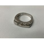 A 14ct white gold and stone set ring. M.