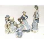 Four Lladro style Rex porcelain figures. (4)