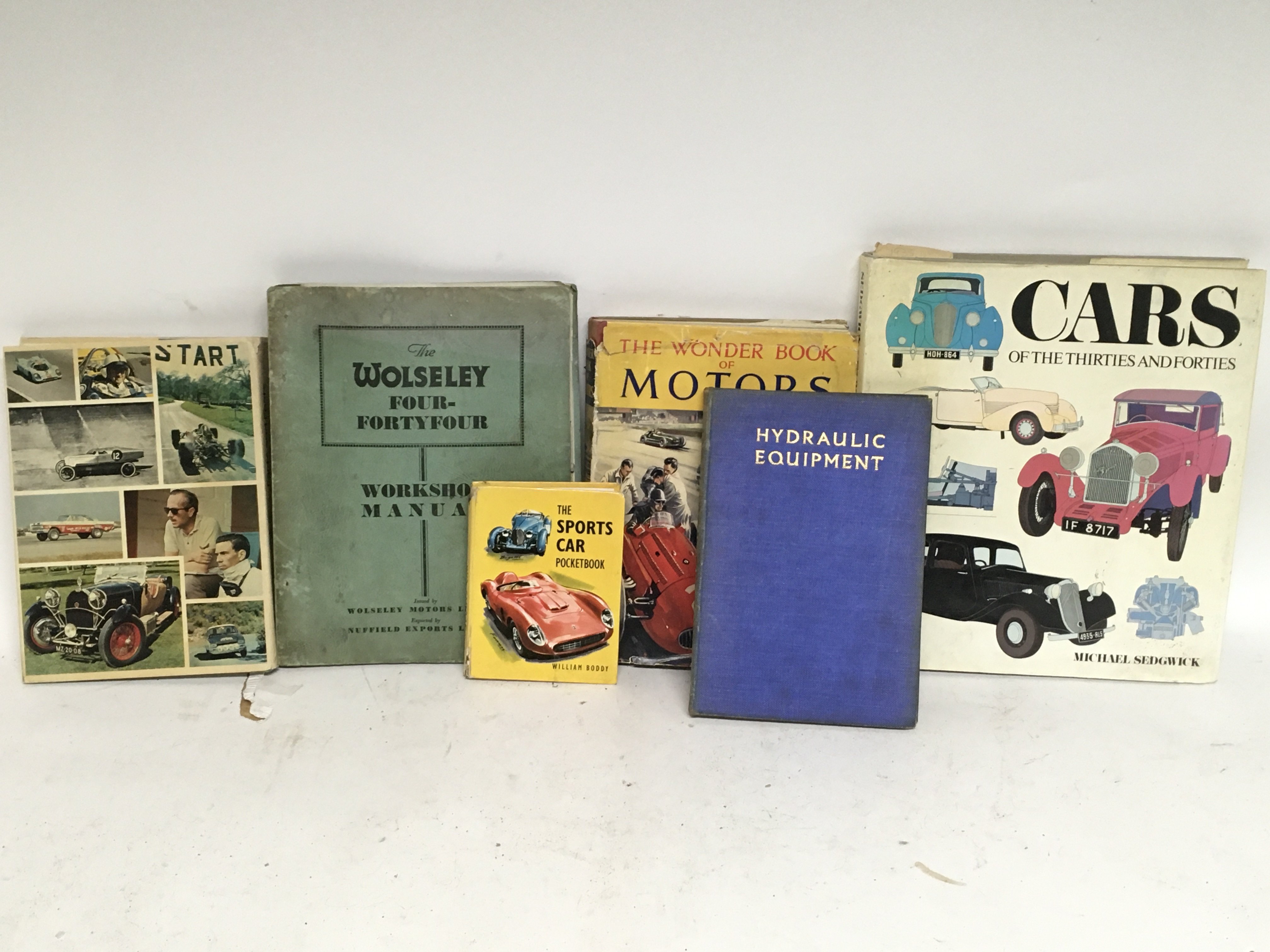 Collection of motor books and other assorted books