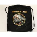 A signed Iron Maiden British Lion canvas bag.