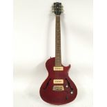 A 1998 Gibson Blues Hawk in dark red, serial numbe