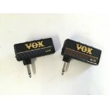 Two Vox plug in headphone amplifiers.