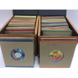 Four record cases of 7inch singles by various rock