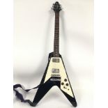 A Westfield Flying V shaped electric guitar. Comes