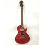 An Epiphone Les Paul style electric guitar in red,