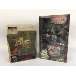 Two boxed Iron Maiden Eddie models comprising a se