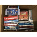 A box of DVD box sets including The Six Million Do