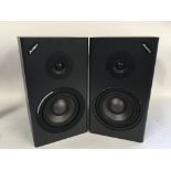 A pair of Alesis Monitor One MK2 bookshelf speaker