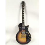 A Les Paul style electric guitar with built in eff