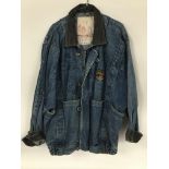 A denim jacket fully signed by Iron Maiden, size L