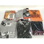 A box of various brand new band t shirts, mostly s