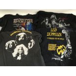 A collection of band t shirts of various rock arti