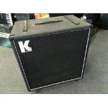 A Kustom 200W bass amp speaker cabinet.