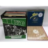 A record case of LPs and 12inch singles by various