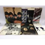 Seven early UK issue Beatles LPs including 'Revolv