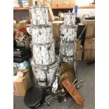 A Pearl drumkit with stands, stool and sticks.