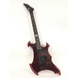 An unmarked B.C. Rich style electric guitar fitted