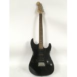 A Fender Squier Showmaster electric guitar in blac