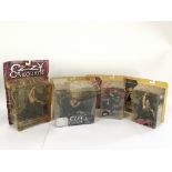 Four boxed models of rock legends comprising Ozzy