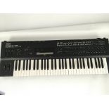 A Yamaha DX7 II FD keyboard plus cartridges.