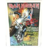 A fully signed Iron Maiden poster advertising the