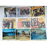 A collection of vintage lobby cards including main