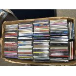 Two boxes of CDs by various artists.