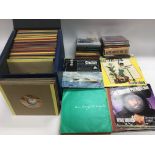 Two record cases of 7inch singles and CDs by vario