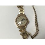 A 9ct gold cased Avia ladies wristwatch.
