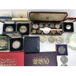 A box containing various coin sets Royal mint and