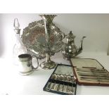 A silver plated Epergne tray cased cutlery a silver rimed decanter and other oddments (a lot)