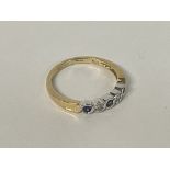 A Sapphire and Diamond ring in 14ct Gold, size N.