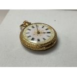 An 18ct enamelled dial fob watch.
