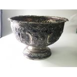 A silver bowl with repousse chasing no personal in