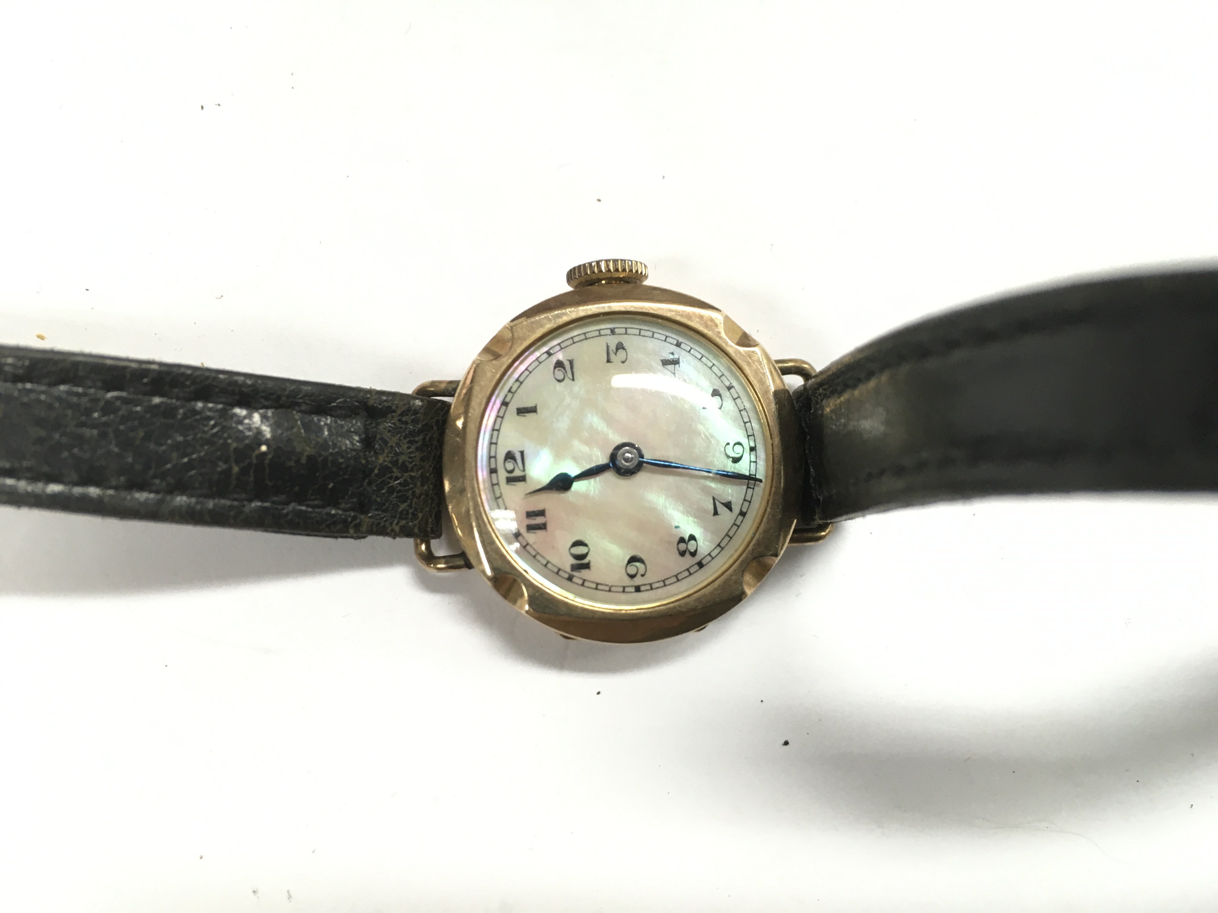 A ladies gold cased watch.