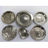 Six silver dishes, various designs, largest diamet