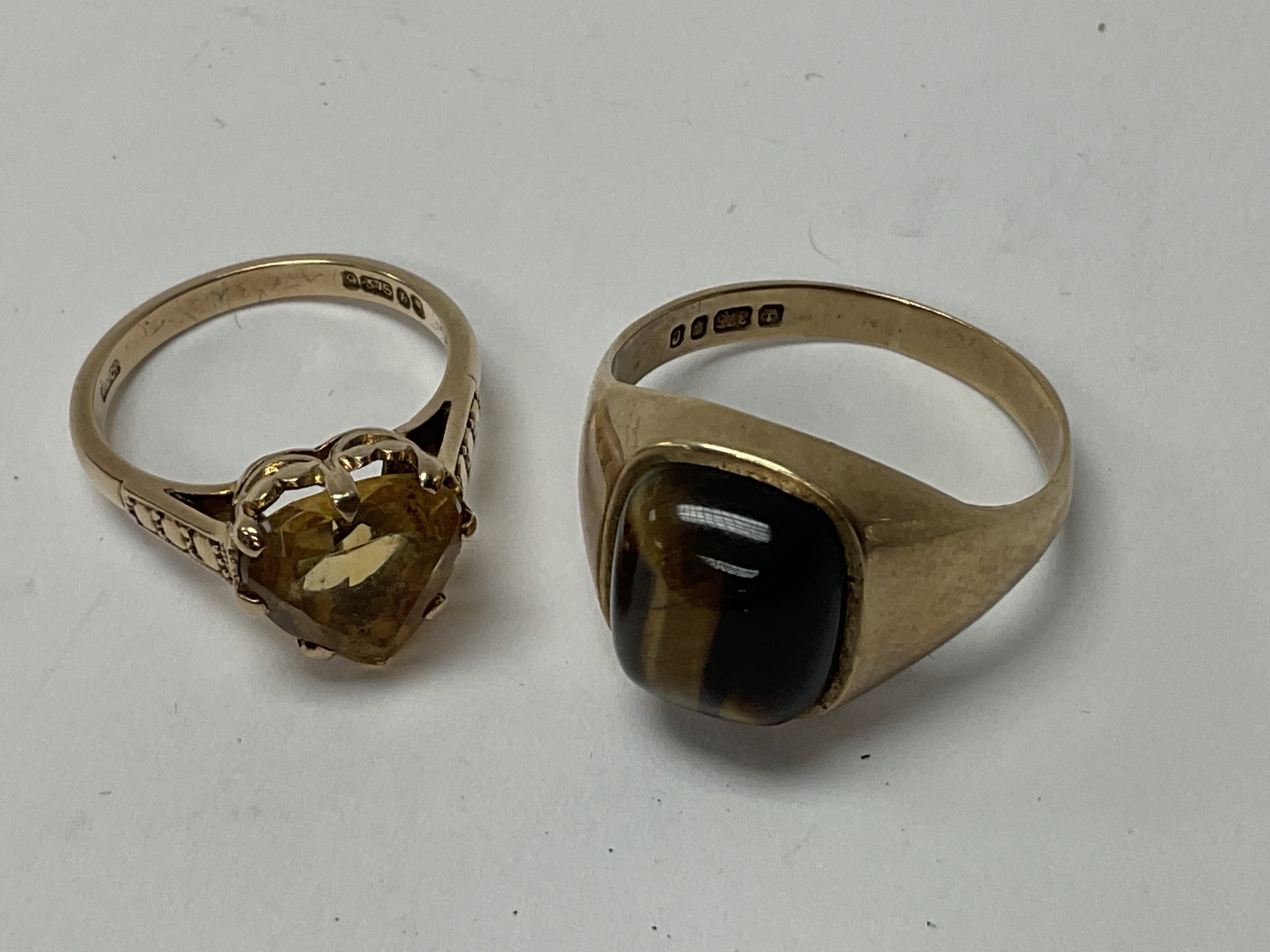 2 9ct gold stone set rings.