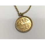 A 1912 half sovereign with mount and chain. 9.5g t
