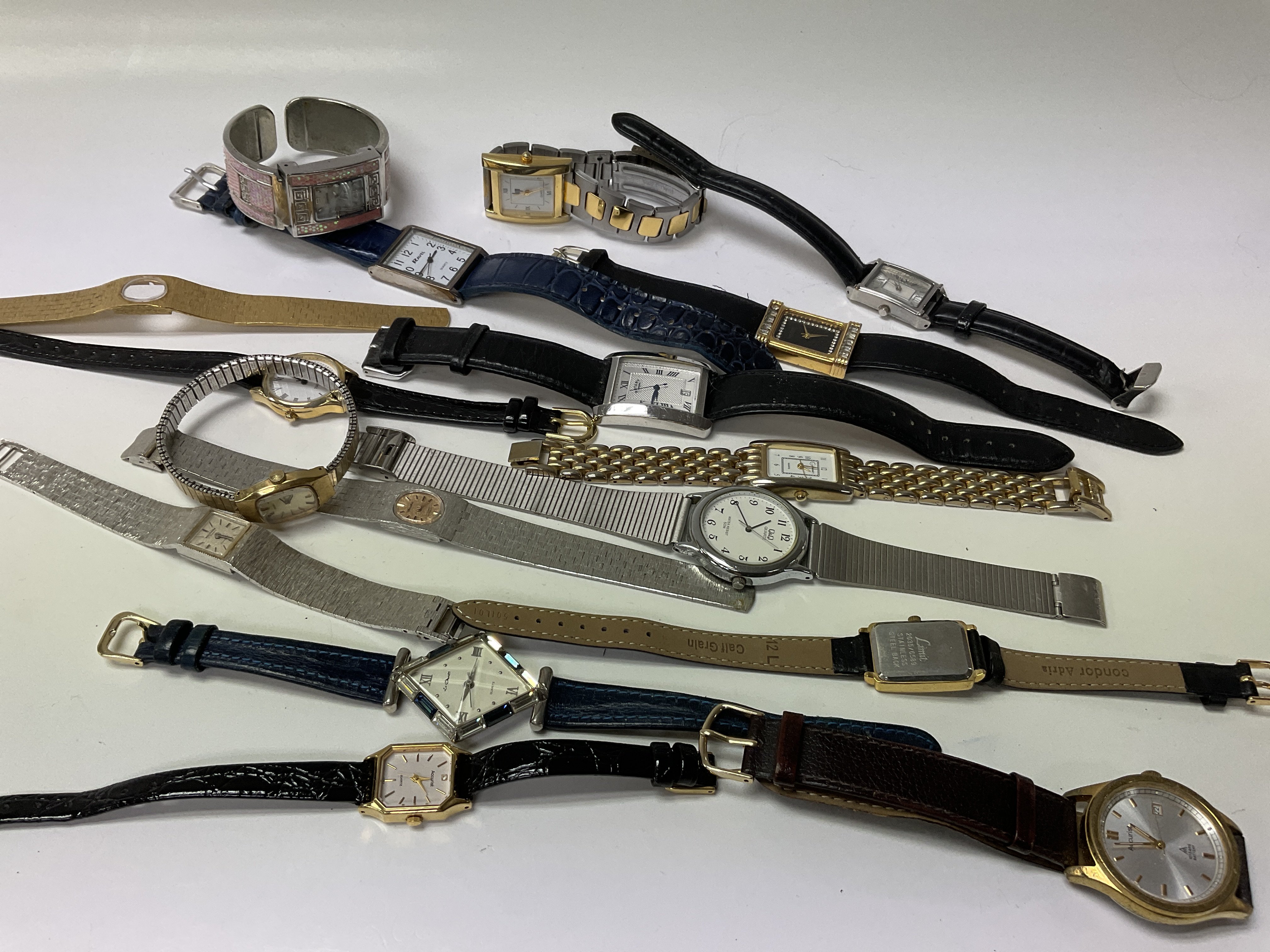 A box of mixed watches.