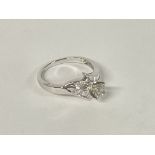 An 18ct White Gold modern styled Diamond ring, siz