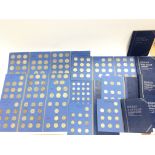 A collection of various British blue coin albums m