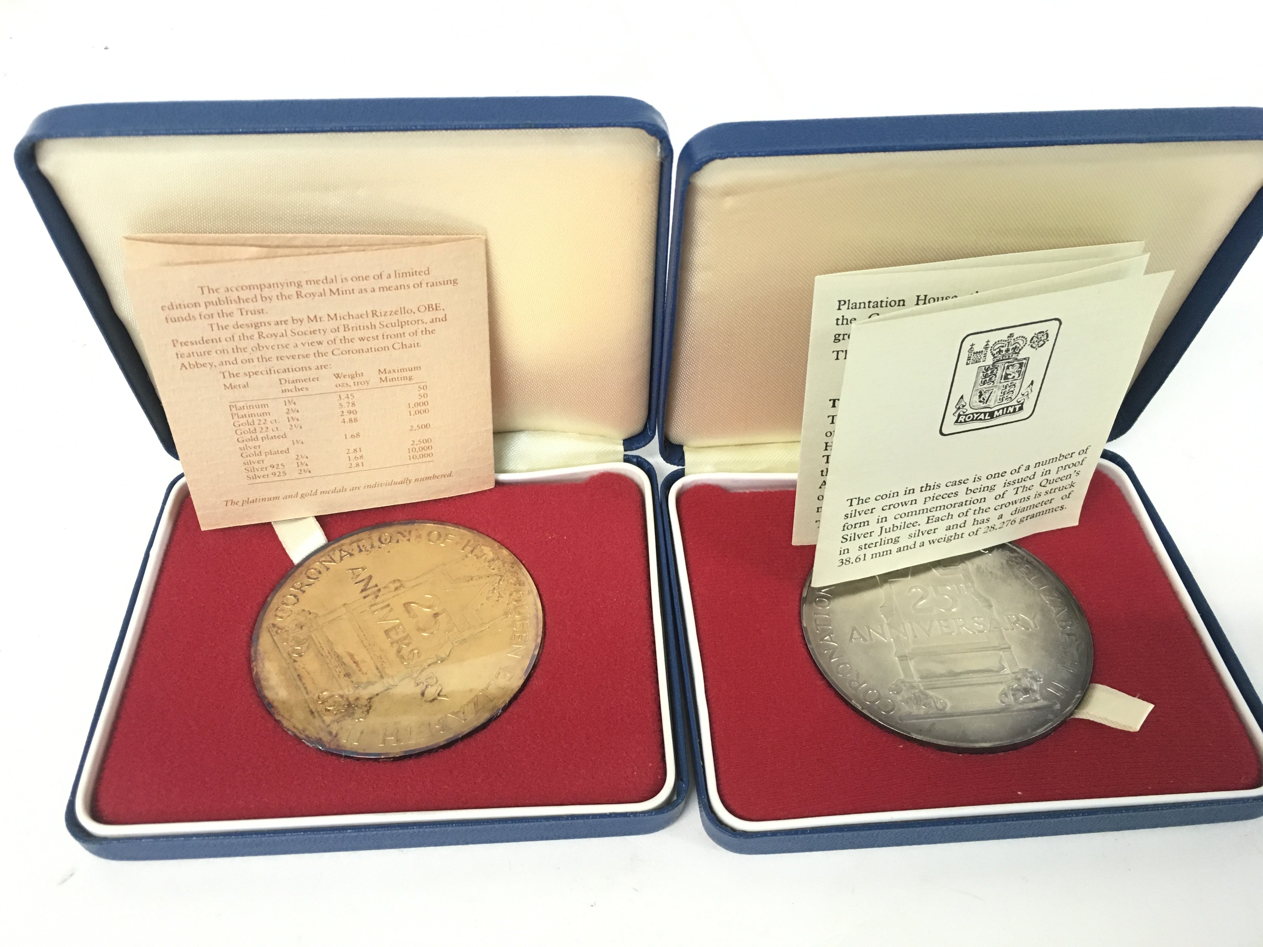 Two medals struck in celebration of the 25th anniv